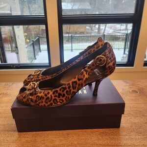 Stuart Weitzman leopard print peep toe heels with gold buckles